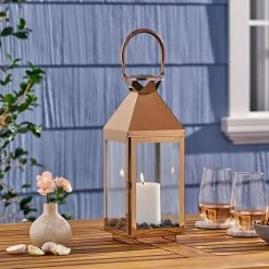Noble House Kestrel Rose Gold Candle 15.50 in. Stainless Steel Lantern -Breeze Decor Sales Store yellows golds noble house outdoor lanterns 69059 31 1000